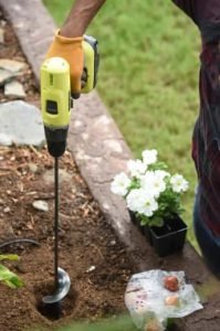 Handheld auger used for garden planting